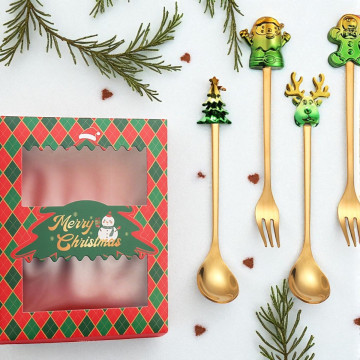 Goudkleurig kerstbestek met kerstfiguren in luxe cadeauverpakking - 4-delig