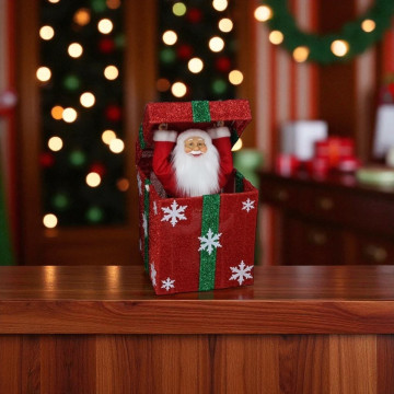 Kerstman in een rood cadeau met groen lint en LED verlichting - 50 cm
