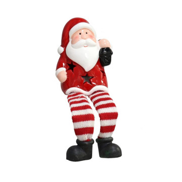 Zittende kerstman met verlichting  