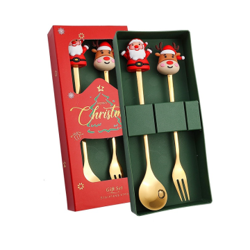 Cadeauset goudkleurig dessertbestek kerstman en rendier 