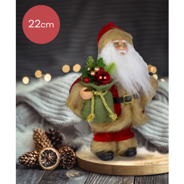 Handgemaakte Kerstman met rood/bruinige kleding en juten zak met kerstballen onder de arm - 22cm