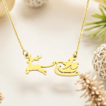 Gouden ketting met rendier en arrenslee