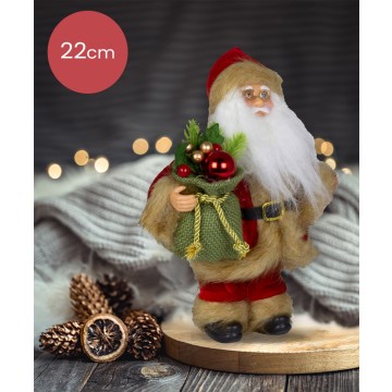 Handgemaakte Kerstman met rood/bruinige kleding en juten zak met kerstballen onder de arm - 22cm